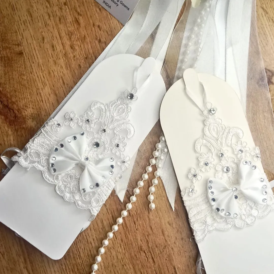 GownLink's Luxurious Enchantment Bridal Gloves with a Bow and Stones of Love G22
