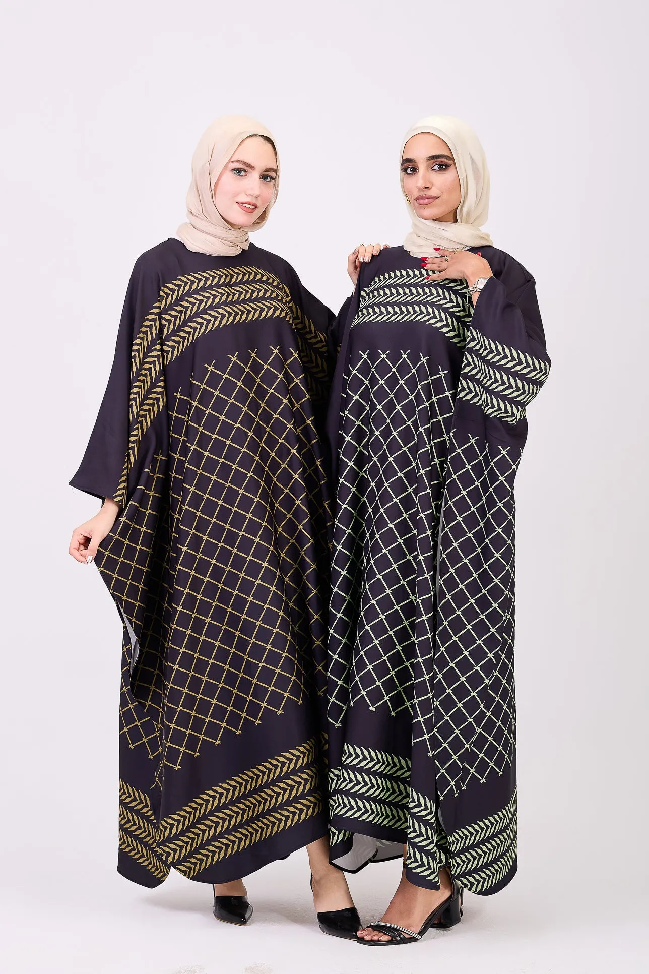 Olfa Luxe Crepe Maxi Dress with Graphic Lines and Geometric Accents